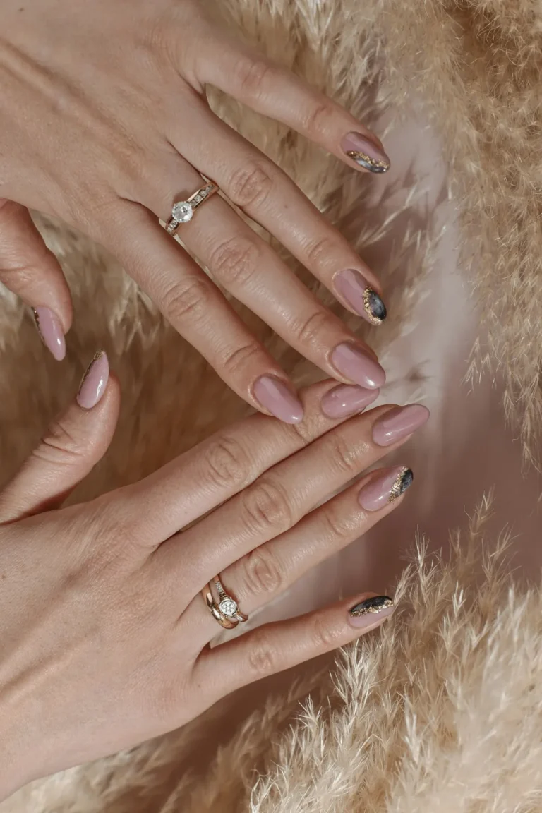 Nude nails with fine accents among pampas grass