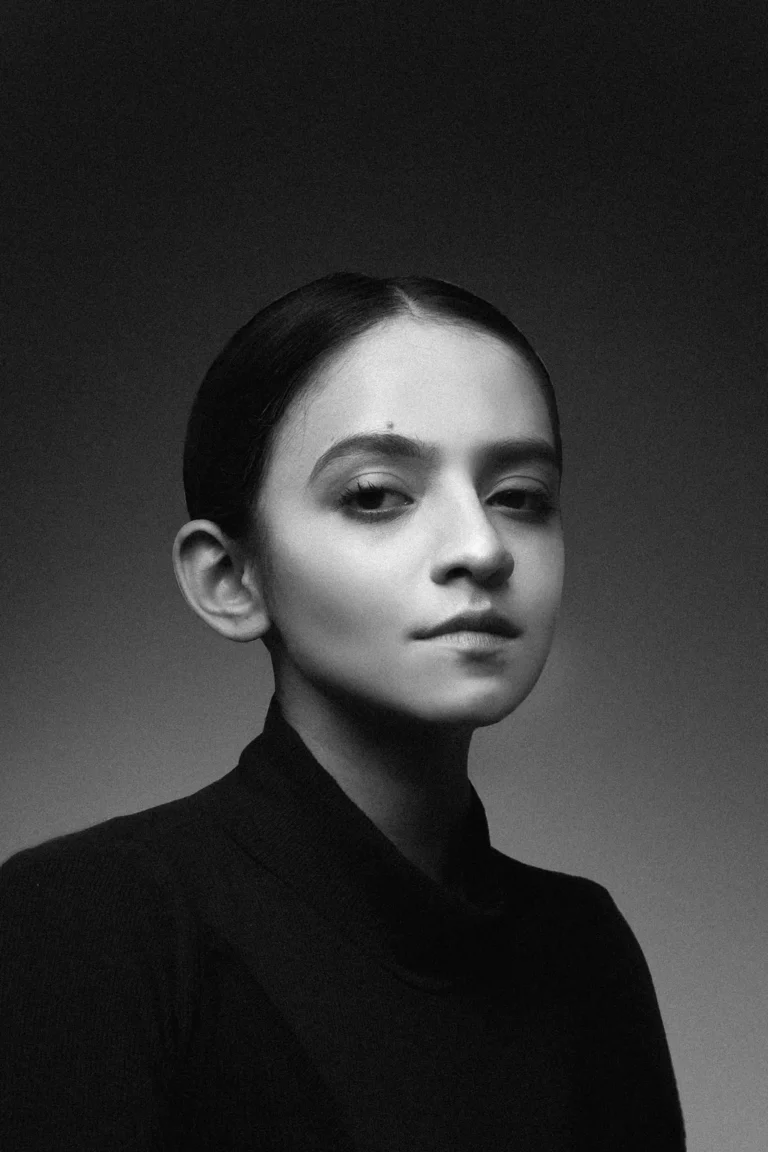 Black and white portrait of a nail artist