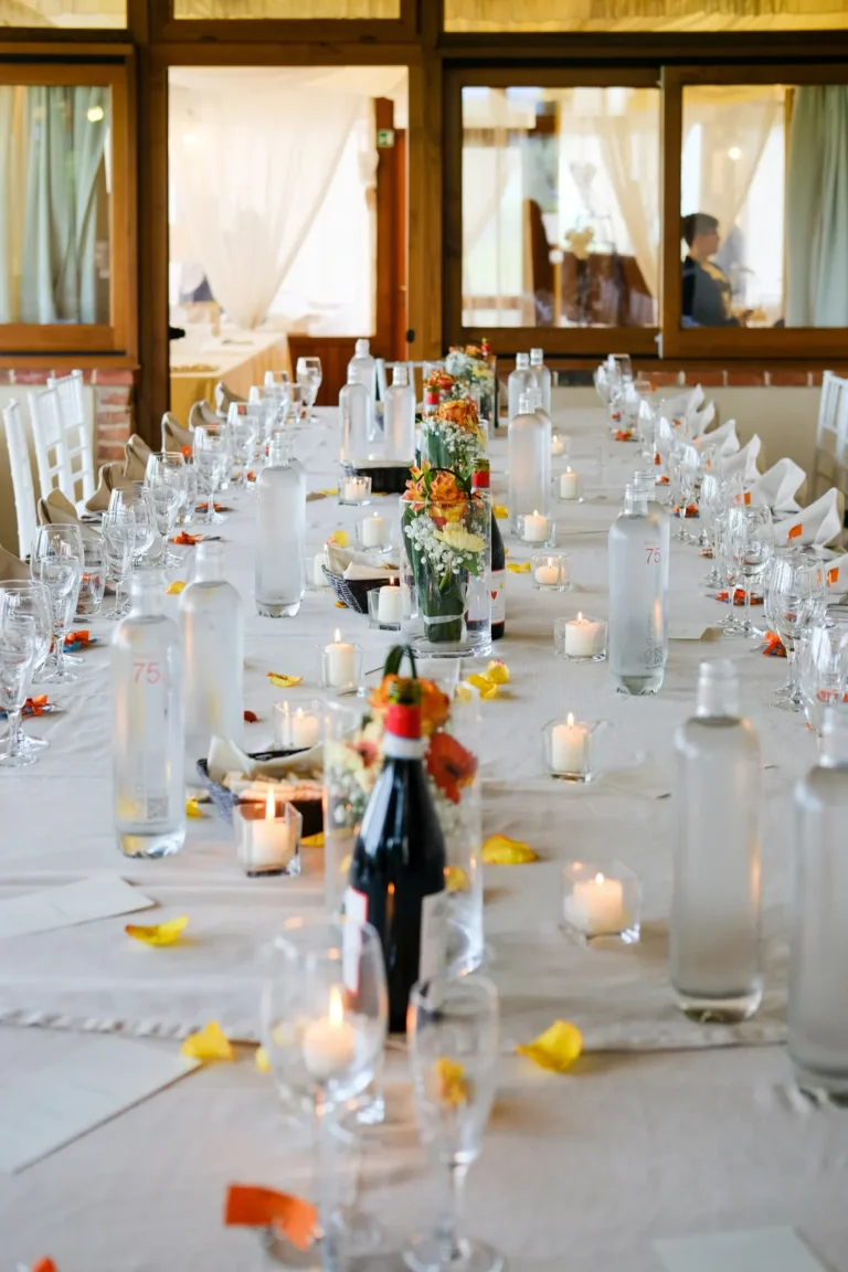 Long table with candles and flowers for a party