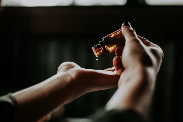 Warm oil poured into the palm