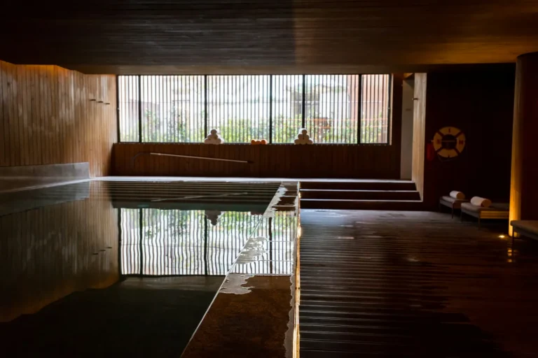 Warm pool in a dark wood hall