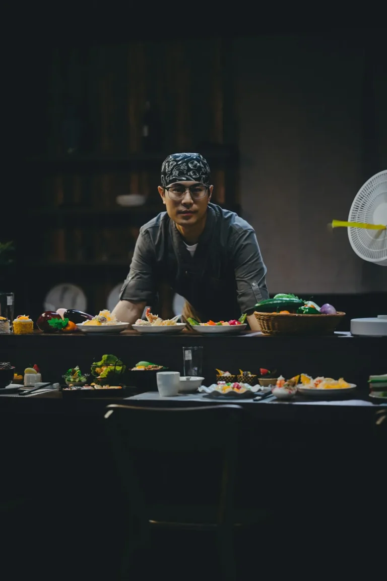 Chef presenting dishes at the pass