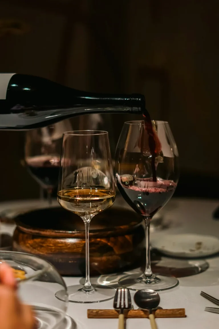 Wine poured into two glasses