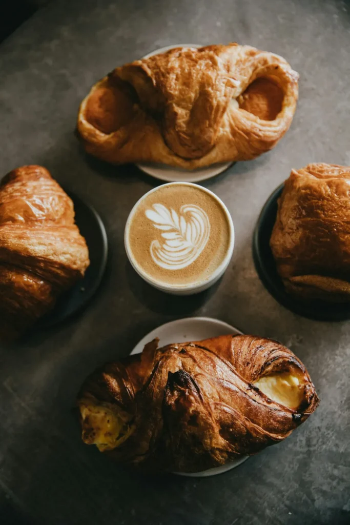 Real photos of drinks and pastries make a coffee shop website feel inviting