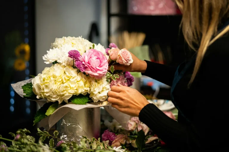 Florist arranging hydrangeas