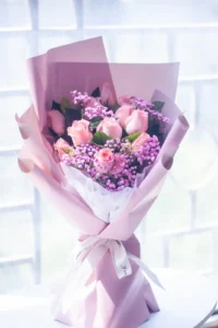 Lilac bouquet in wrapping paper