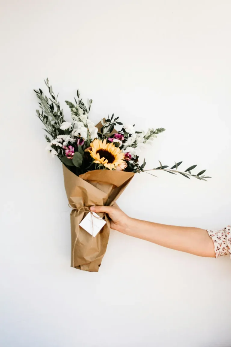 Sunflowers wrapped in kraft paper