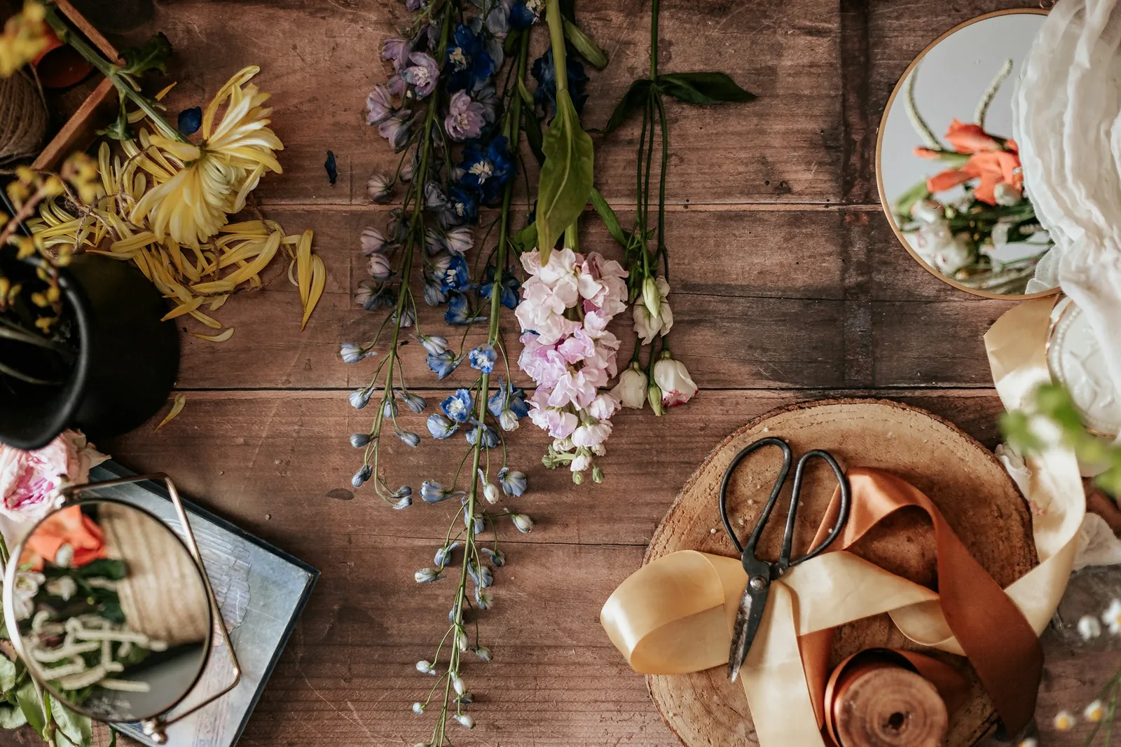 Florist's table with scissors and ribbon