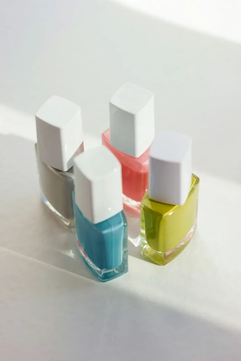 Pastel polish bottles with white caps