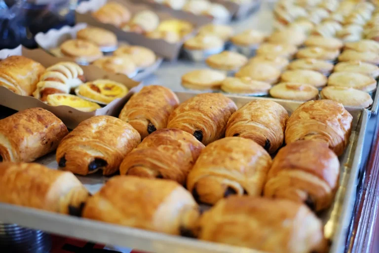 Trays of chocolate pastries and egg tarts