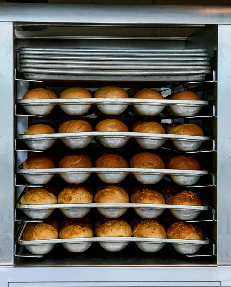 Rack of fresh rolls for restaurant orders