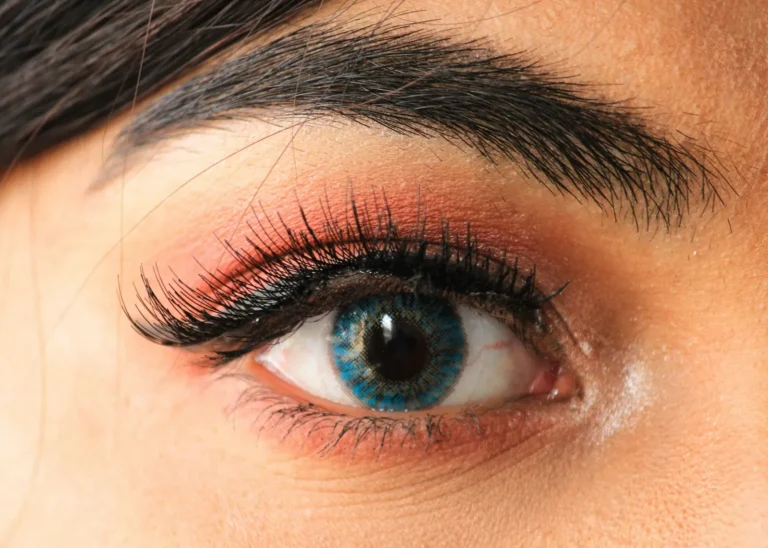 Volume lashes with coral eyeshadow