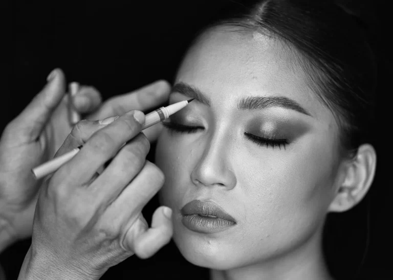 Brows drawn on before a session, in black and white