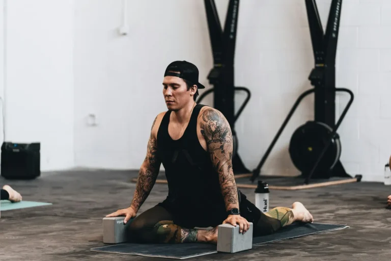 Athlete stretching with yoga blocks
