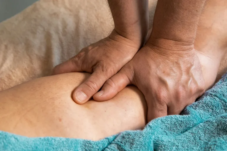 Deep pressure on the arm over a teal towel