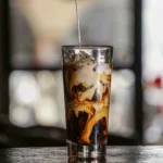 Vietnamese iced coffee with condensed milk swirl