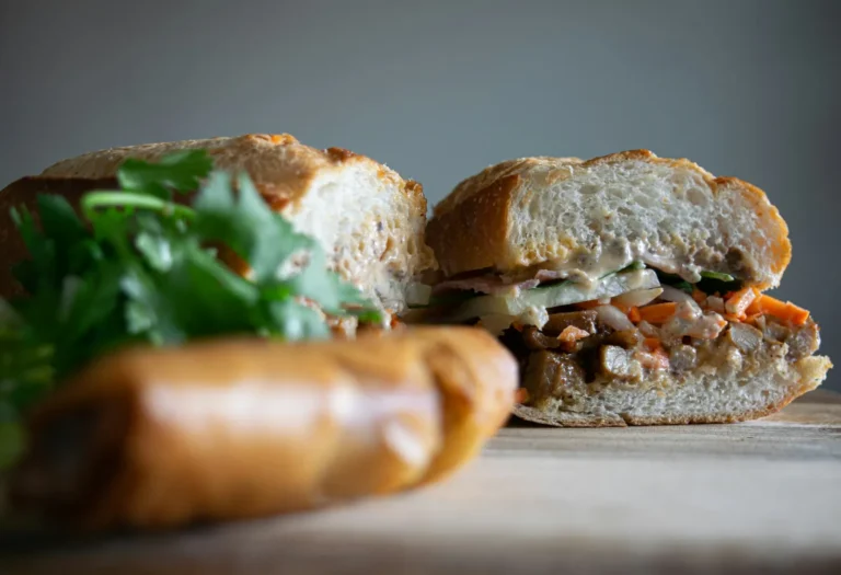 Two banh mi halves with grilled pork