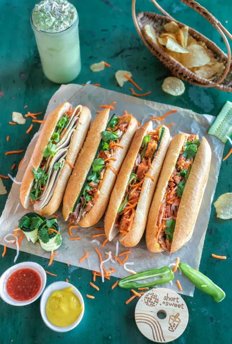 Four banh mi in a row, seen from above