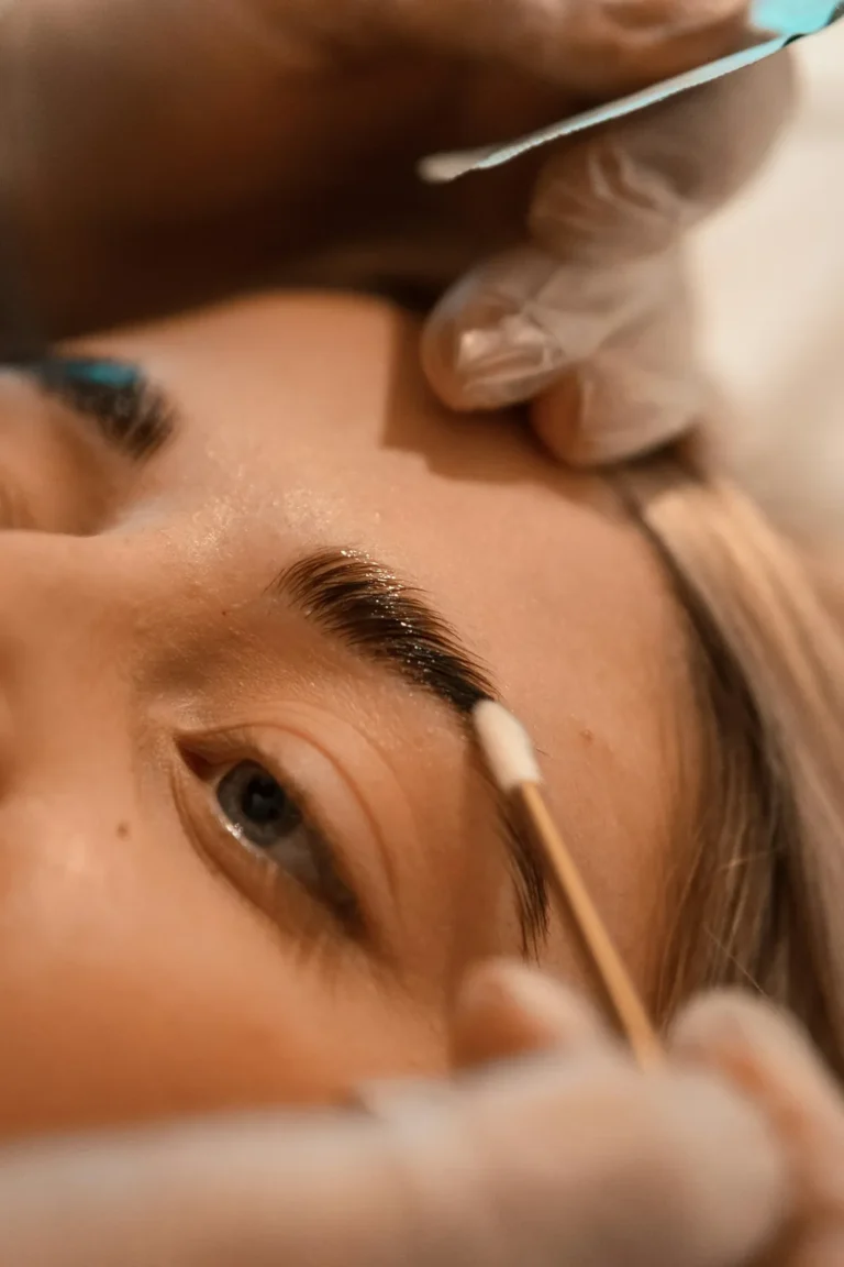 Brows being brushed into shape