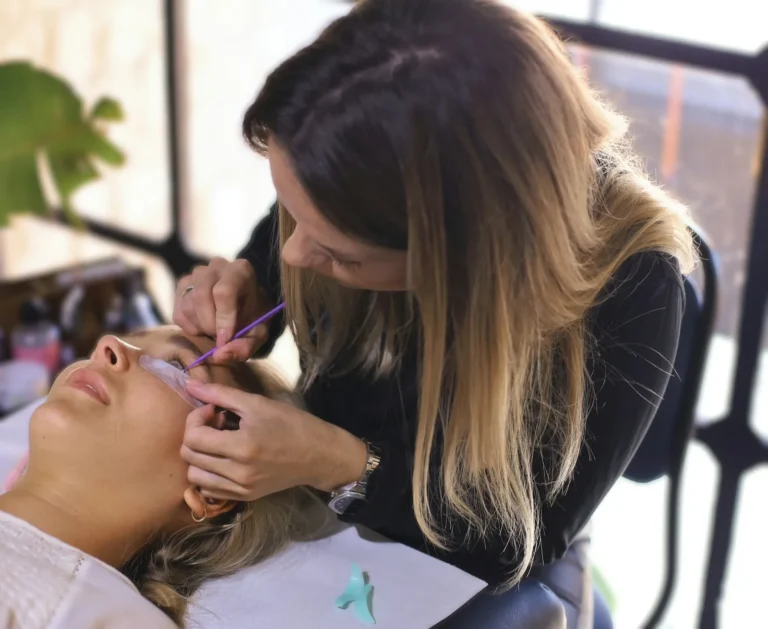 Lash artist working on a client