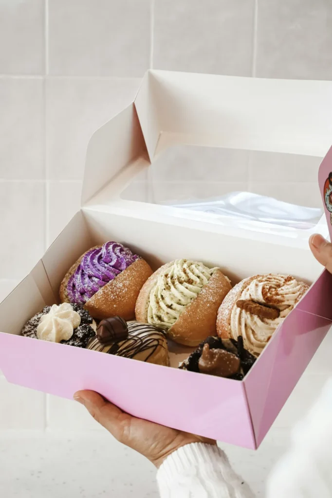 Cream puffs packed in a pastry box