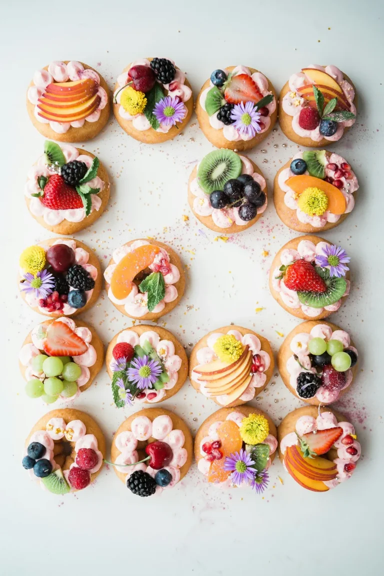 Fruit tartlets with edible flowers
