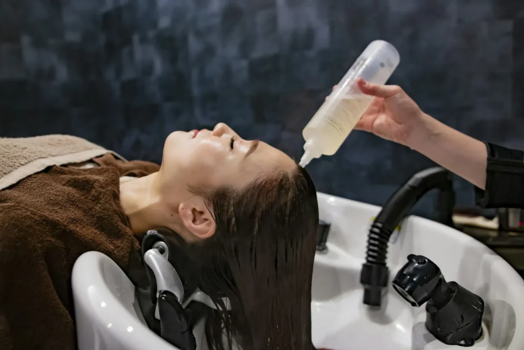 Scalp rinse at the shampoo basin
