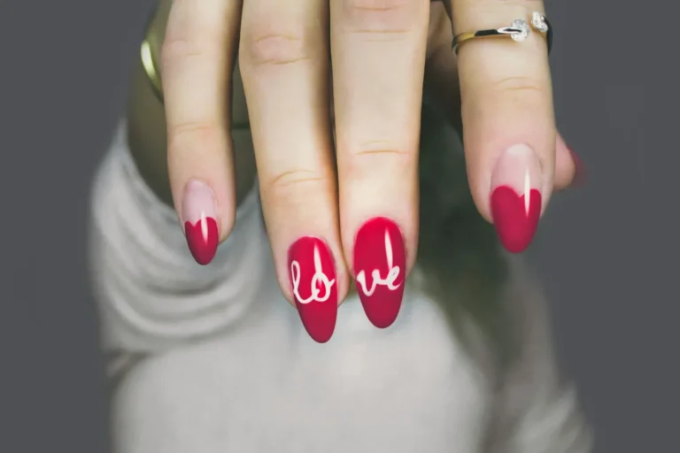 Red nails with hand-lettered love art
