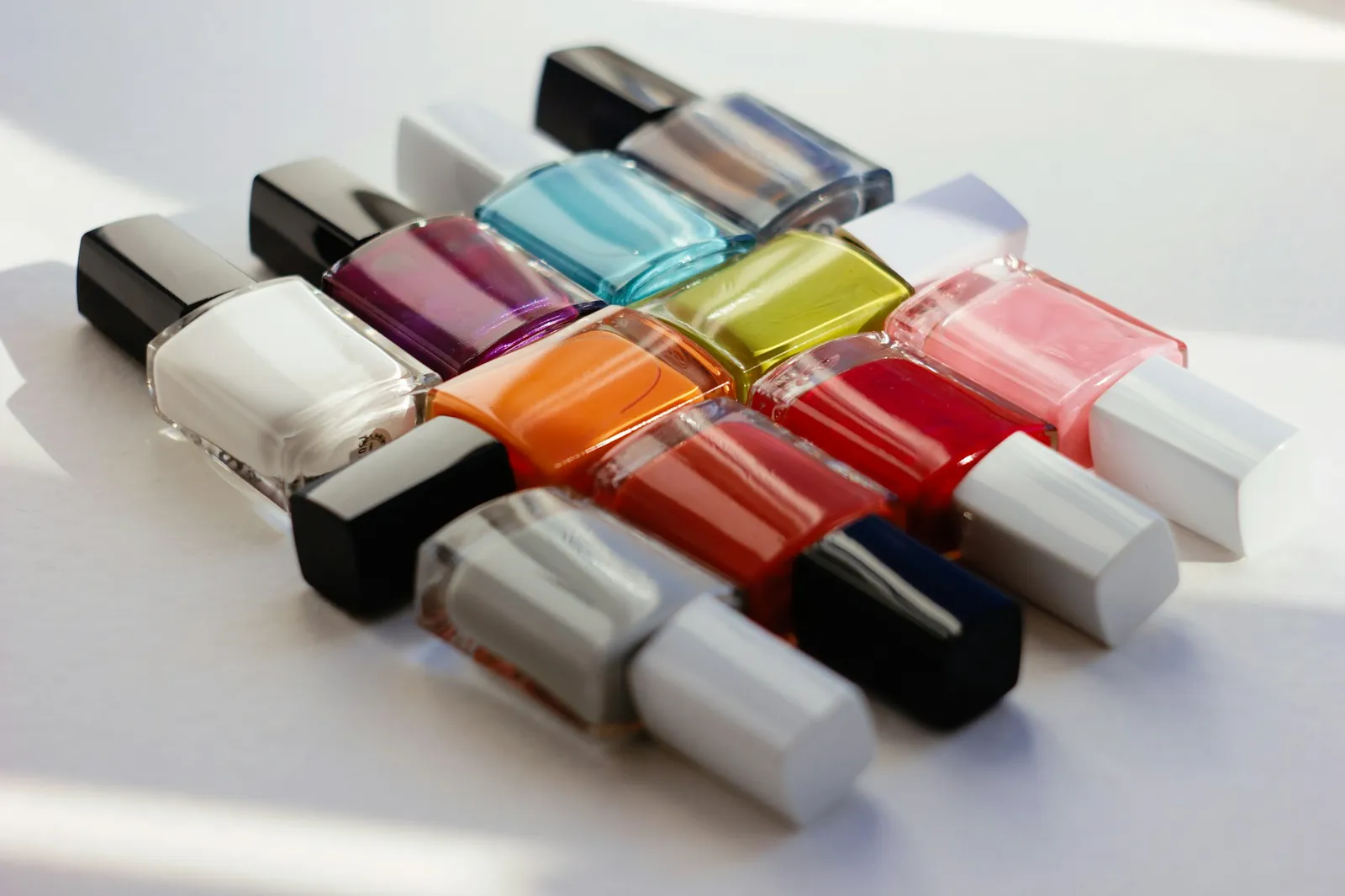 Rows of colorful nail polish bottles