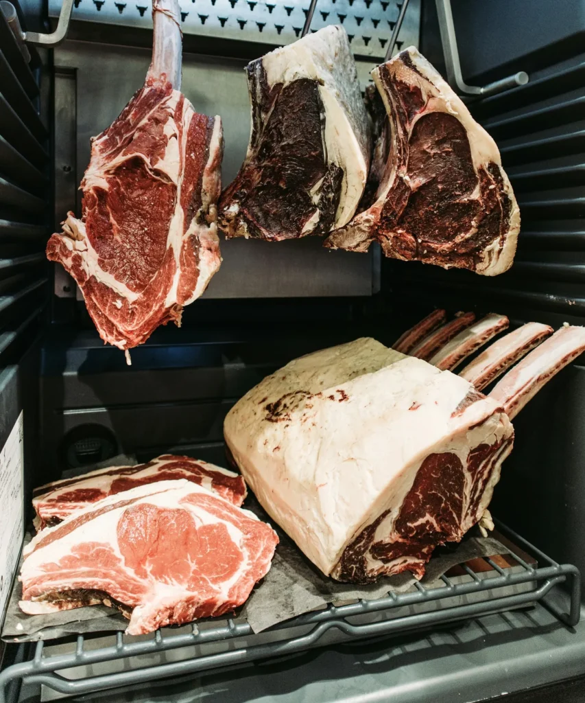 Beef ribs and loins in a dry-aging cabinet