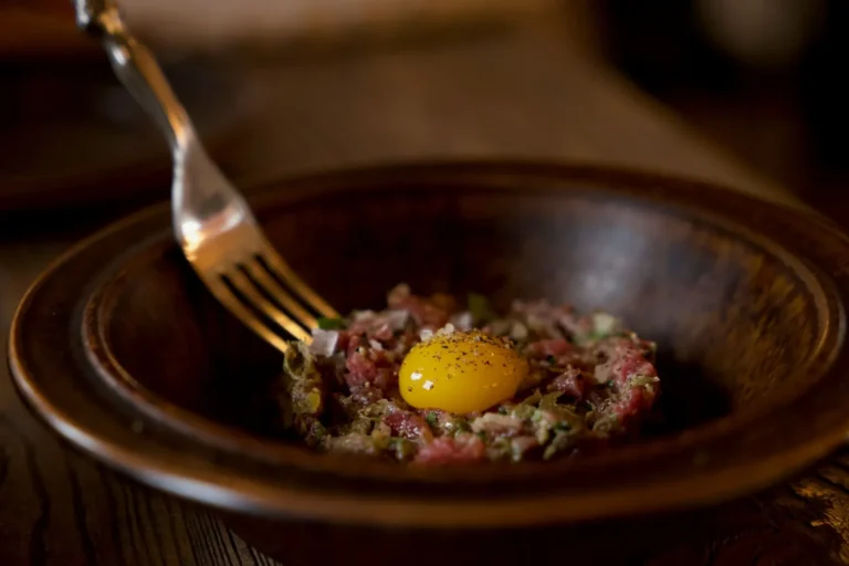 Steak tartare with an egg yolk