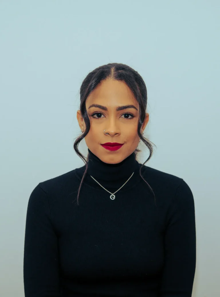 Portrait of a nail artist with red lipstick