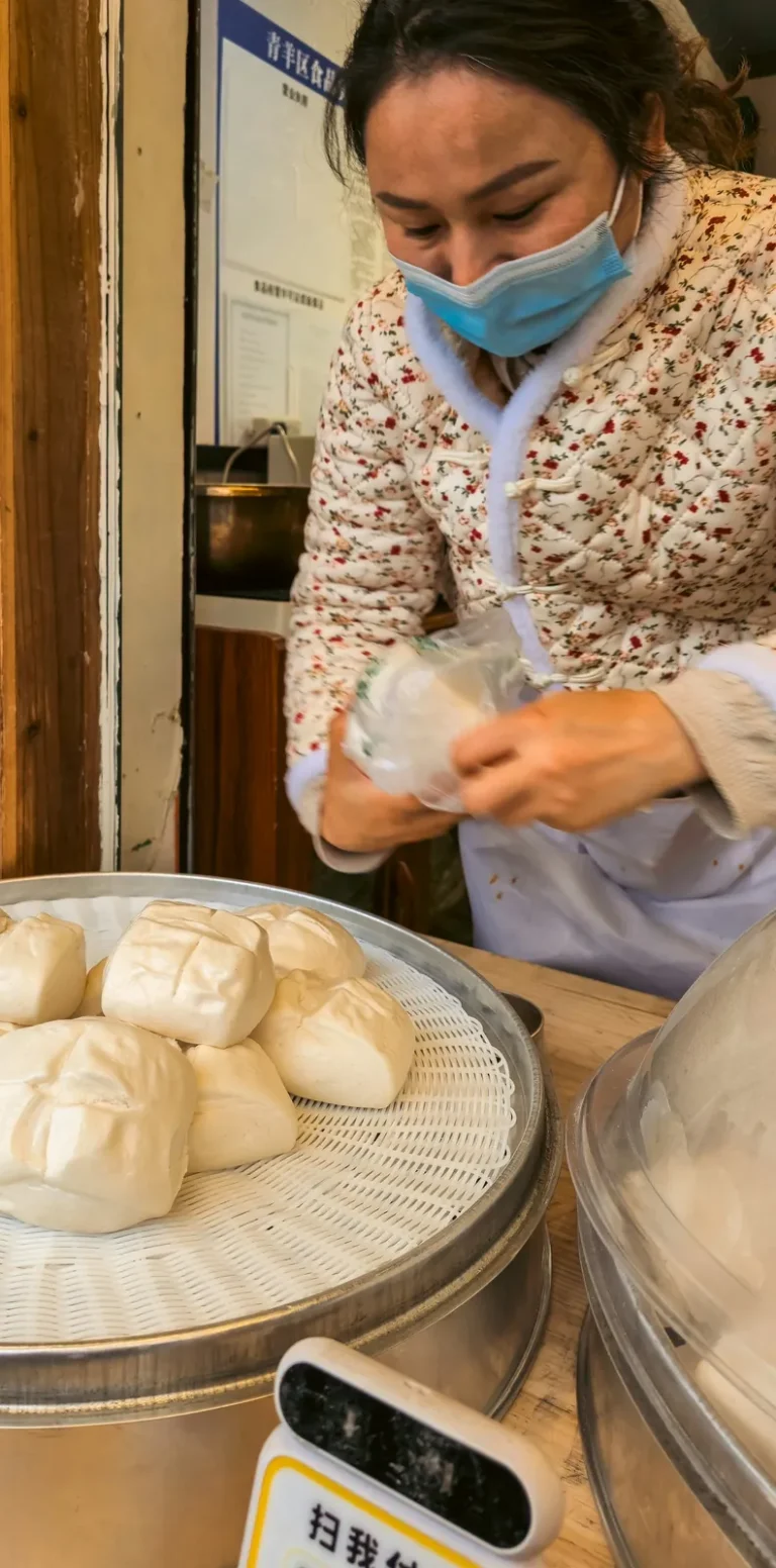 Steamed buns in a bamboo steamer