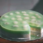 Pandan and coconut layer jelly cake, sliced