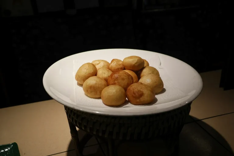 Sesame balls on a white plate