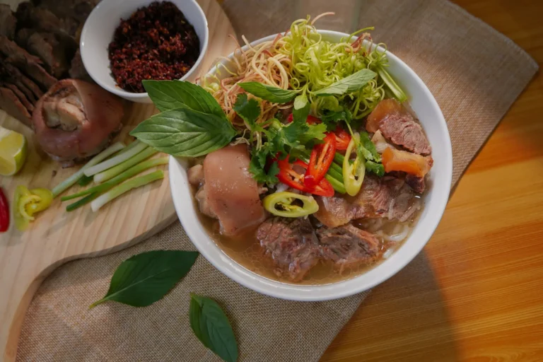 Spicy beef noodle soup with lemongrass and herbs