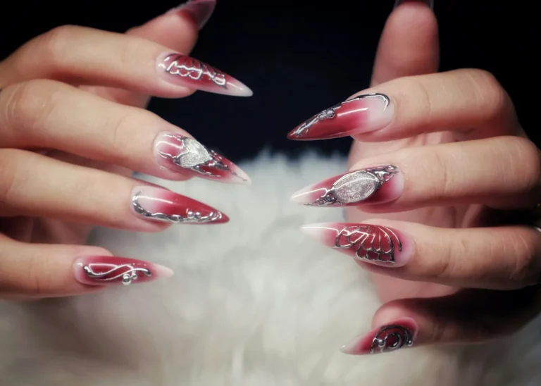 Glitter and line art on stiletto nails