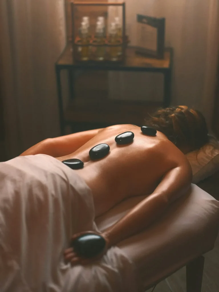 Warm stones along the back in a dim room