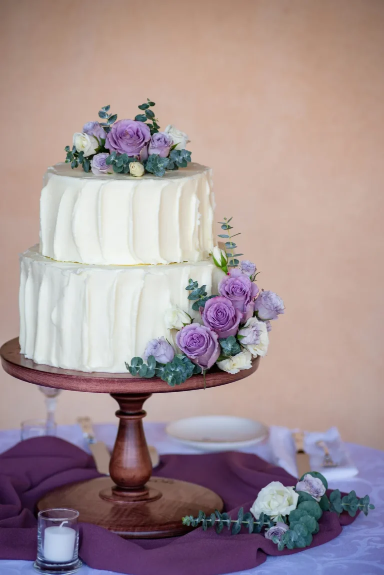 Buttercream wedding cake with lilac roses