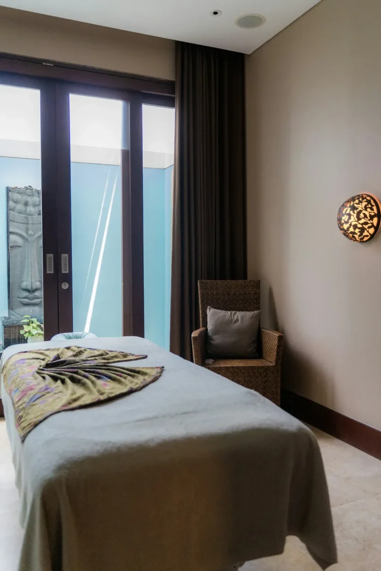 Treatment room with a folded towel on the table