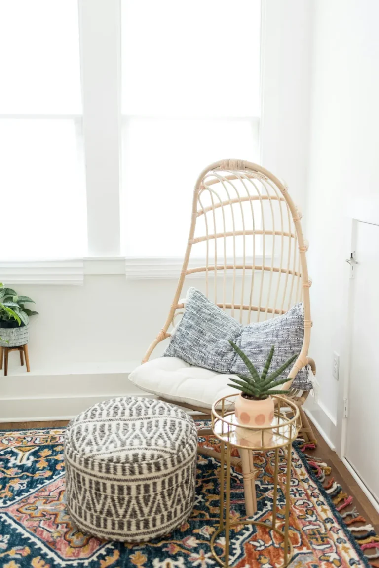 Hanging rattan chair with cushions