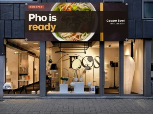 A pho restaurant banner hung on the shop front