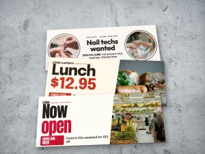 Three vinyl banners laid out: now hiring, lunch special and a market opening