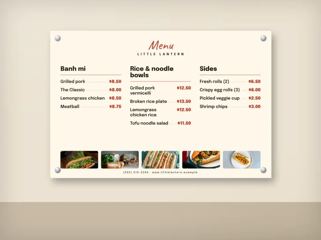 A restaurant wall menu on rigid board held by standoffs
