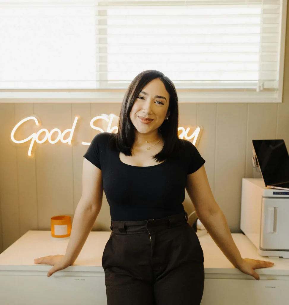 A small business owner at her shop counter