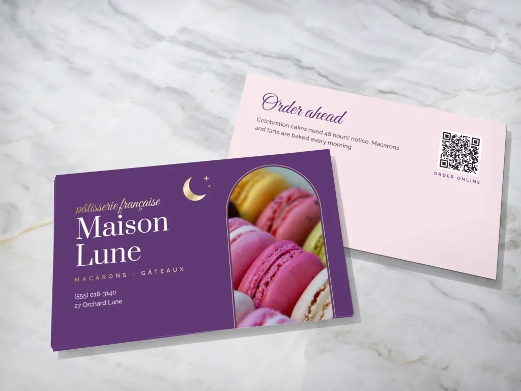 Business card template BC-15 for a bakery or café: Maison Lune, plum, macarons in an arch, crescent moon