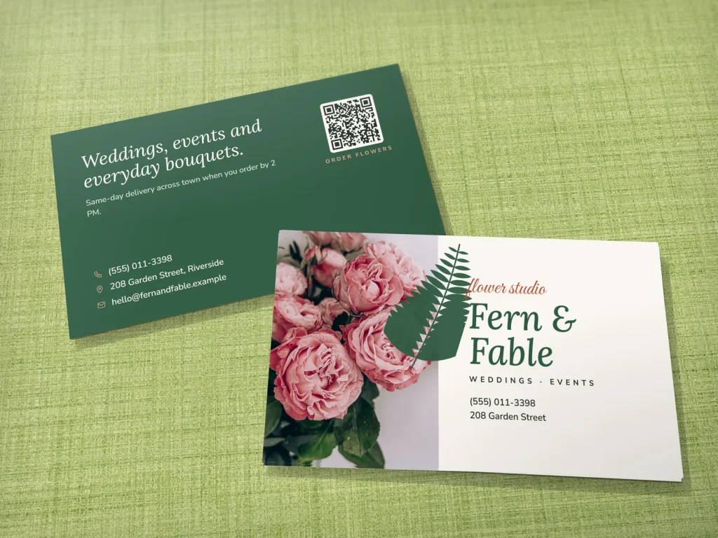 Business card template BC-17 for a shop: Fern & Fable, roses photo, forest green type, fern frond
