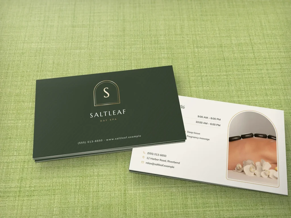 Triple-layer business card template BL-03 for a spa: Saltleaf, deep sage with a pale gold foil S in a double arch