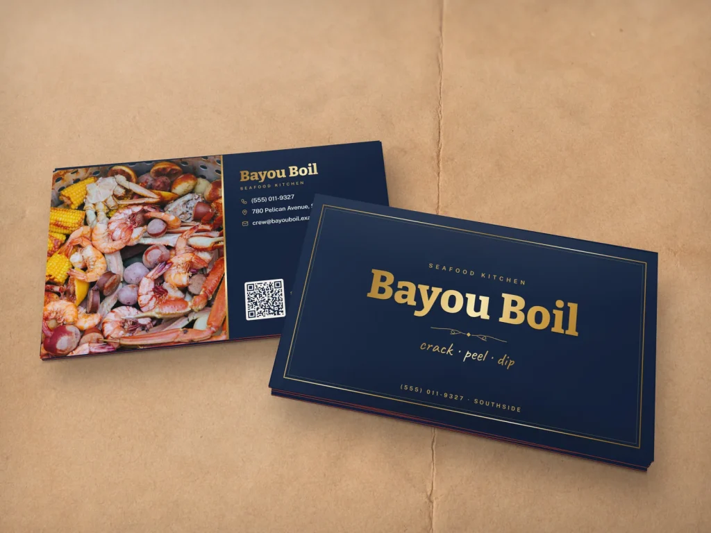 Triple-layer business card template BL-10 for a restaurant: Bayou Boil, navy with a gold foil name and handwritten tagline