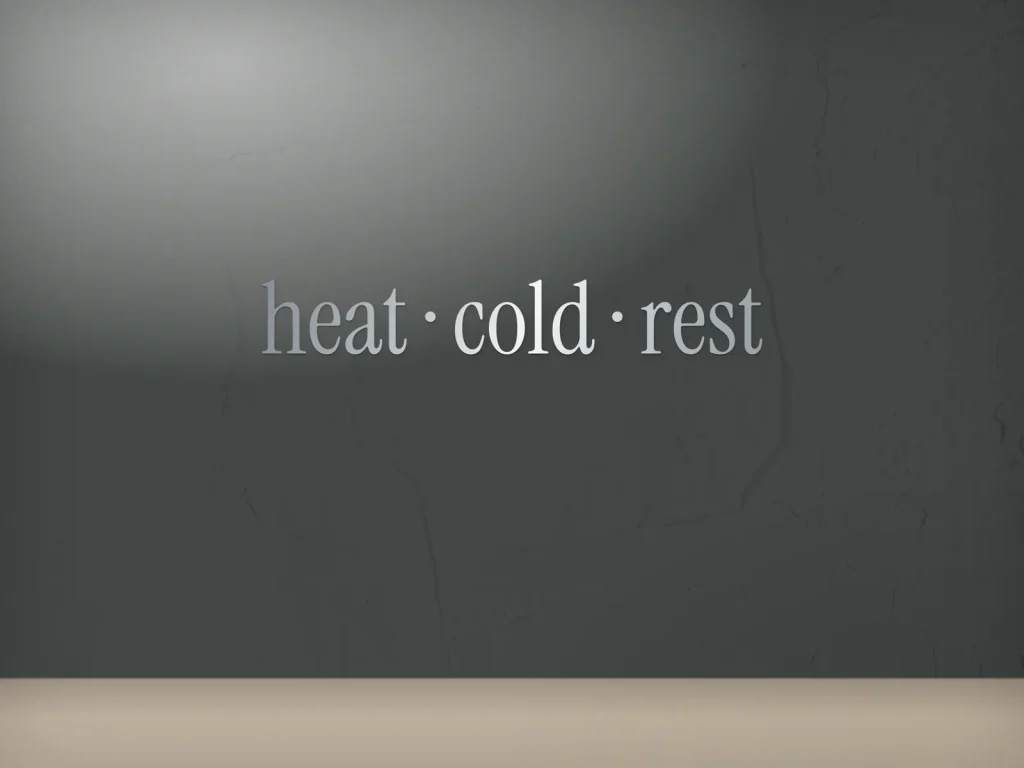 Cut vinyl lettering template CV-20 for a spa: Fog & Cedar, silver “heat · cold · rest” on a dark wall